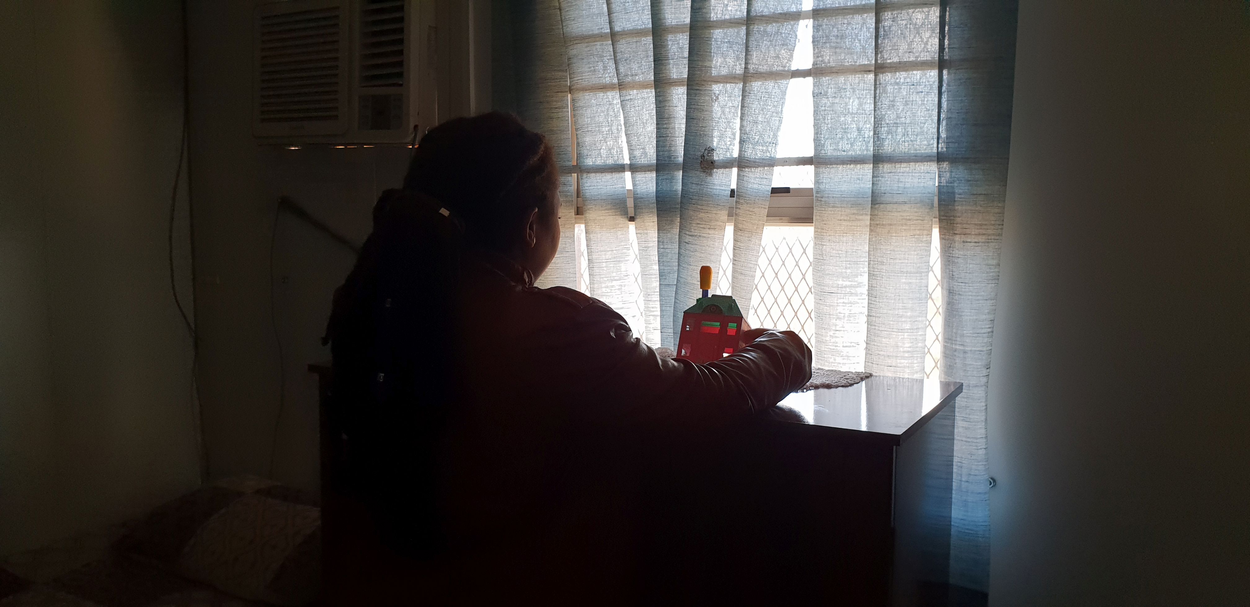 Woman at a domestic violence shelter. Woman at a domestic violence shelter