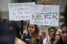 A woman advocates intersectional feminism at a protest in South Africa
