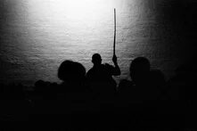 Black and white image using force to keep power