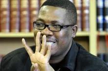 JOHANNESBURG, SOUTH AFRICA - JUNE 28: Basic Education spokesperson Panyaza Lesufi at a press conference in Johannesburg, South Africa on June 28, 2012 regarding the delivery of textbooks to Limpopo Schools. 