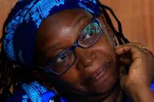 Stella Nyanzi stands in the dock at Buganda Road court charged with cybercrimes after she posted profanity-filled denunciations of president Yoweri Museveni on Facebook in Kampala, Uganda.