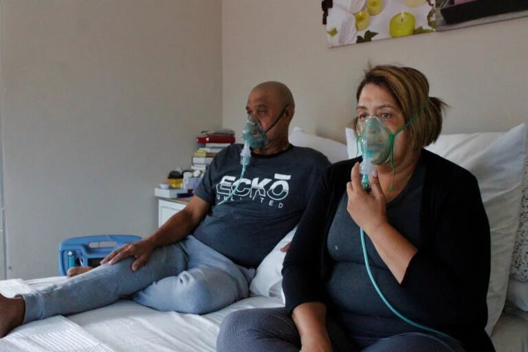 Stewart (59) and Romany Roberts (56) show their morning routine. (Photo: Nomfundo Xolo)“Our bedroom has become a hospital ward.” Romany Roberts says while she tries to find the third medicine bag.