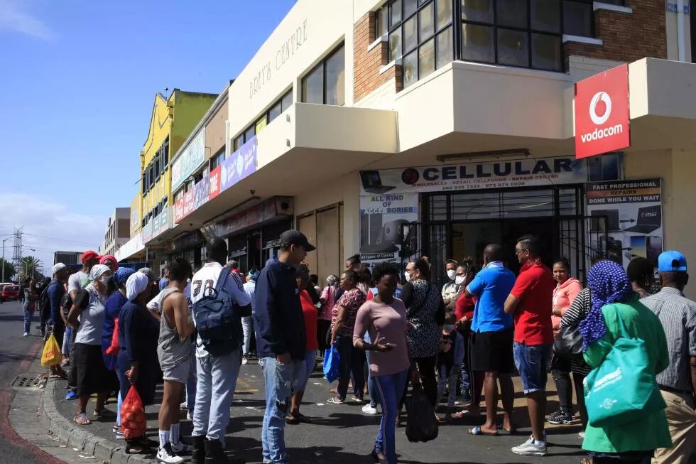  People queuing in the Cape Flats, Cape Town