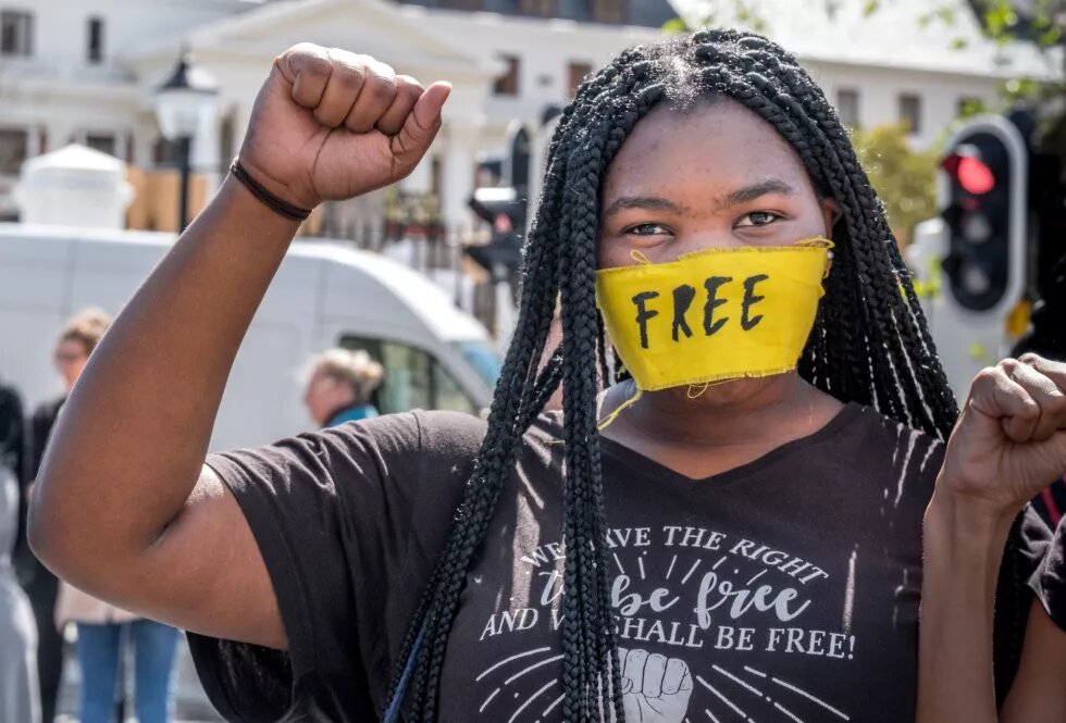 Young woman at a women’s rights protest.