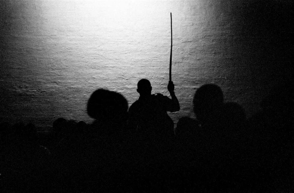 Black and white image using force to keep power