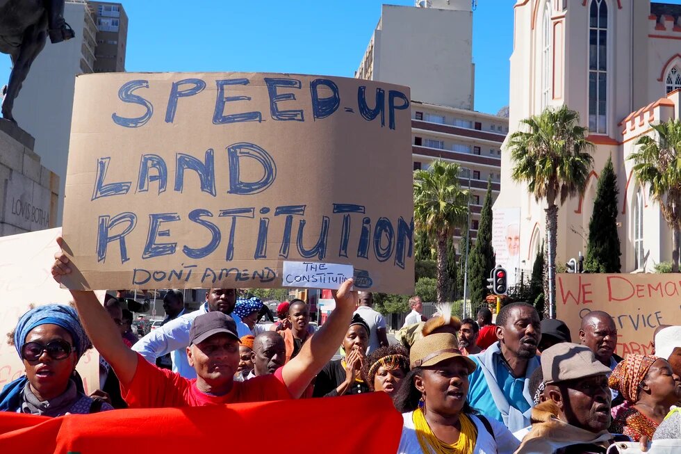 placard with land restitution