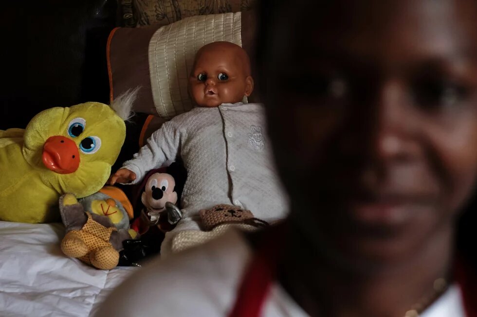 Women often return to life threatening relationships when they feel they have nowhere else to go. Shelters are a life-line for many abused women and their children. Photograph of a woman at a shelter in Gauteng