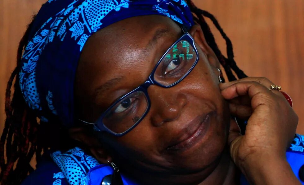 Stella Nyanzi stands in the dock at Buganda Road court charged with cybercrimes after she posted profanity-filled denunciations of president Yoweri Museveni on Facebook in Kampala, Uganda.