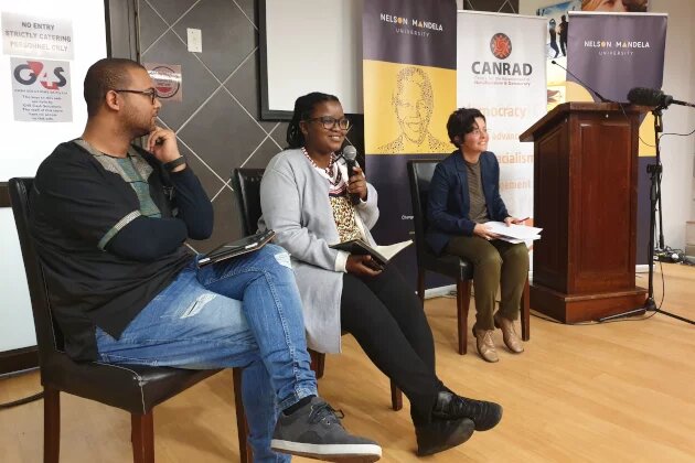 Discussion on 'Keeping the Faith: Working at the Crossroads of Religion and Sexual and Gender Rights'. Melanie Judge (right) and panelists Hanzline Davids (left), from Inclusive and Affirming Ministries, and Pharie Sefalie (middle), from the Traditional Healers Forum, speaking on 'Keeping the Faith: Working at the Crossroads of Religion and Sexual and Gender Rights' at an engagement hosted by Nelson Mandela University's Centre for the Advancement of Non-racialism & Democracy in August 2019.