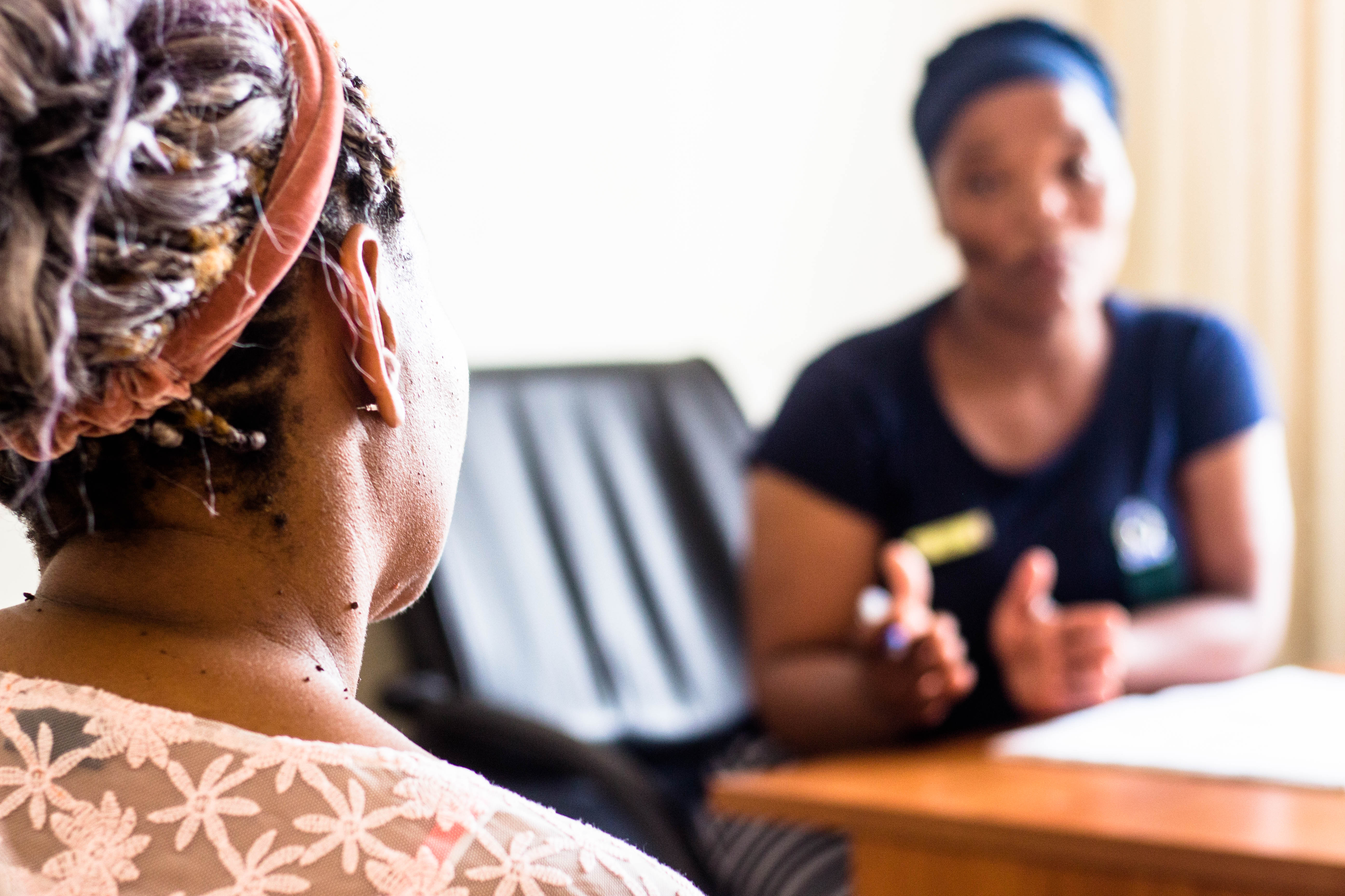 Survivor receiving counselling at a shelter